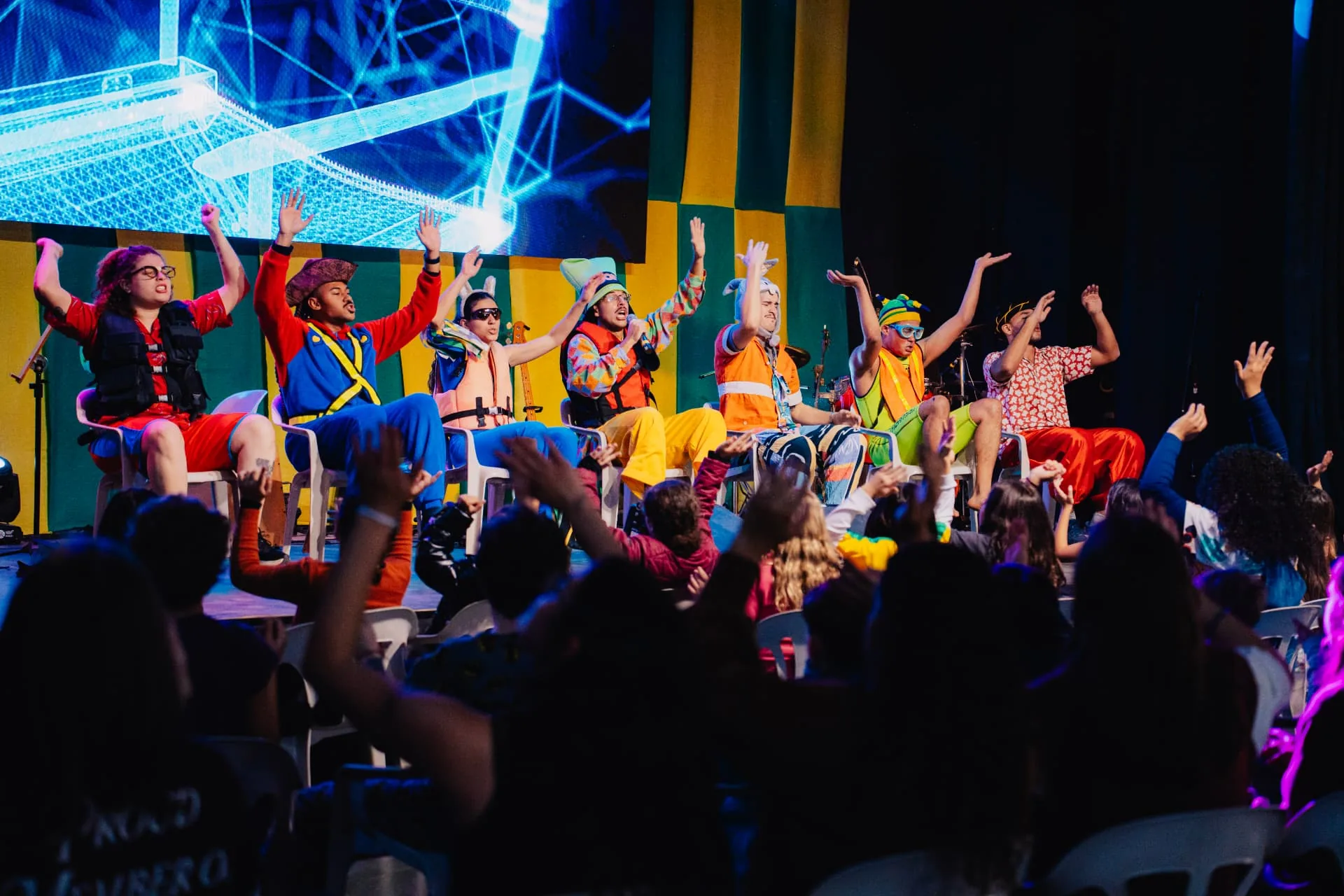 Programação colorida no palco durante a Temporada Kids